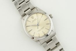 ROLEX OYSTER PERPETUAL REF. 6564 CIRCA 1957, circular silver dial with stick hour markers and hands,