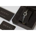 Brand: Ladies Gucci Reference: 102 Movement: Quartz Box: Yes Dial shape: Square Dial colour: Black
