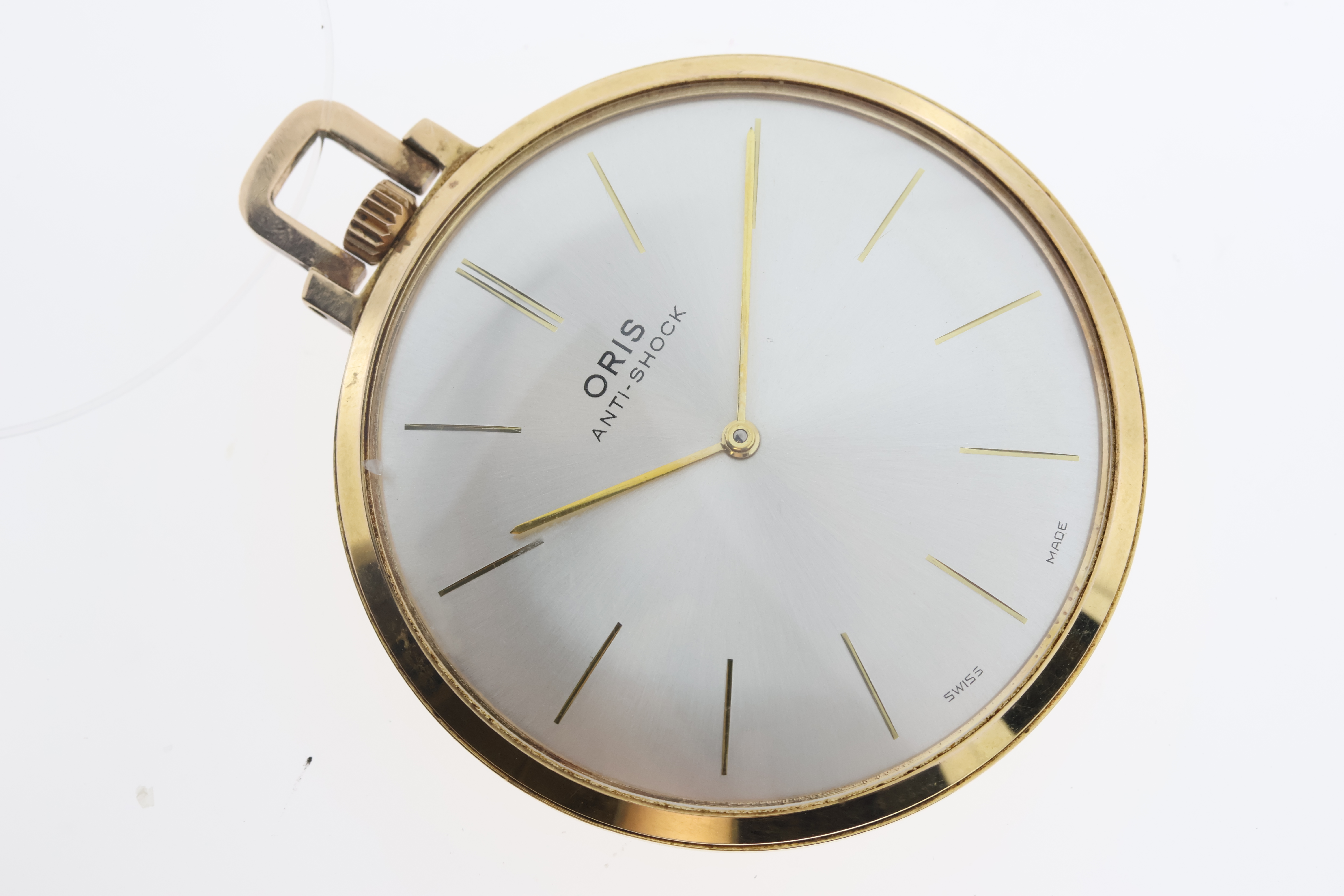 Oris manual wind pocket watch. A sunburst silver dial with gold hands and baton hour markers. Approx