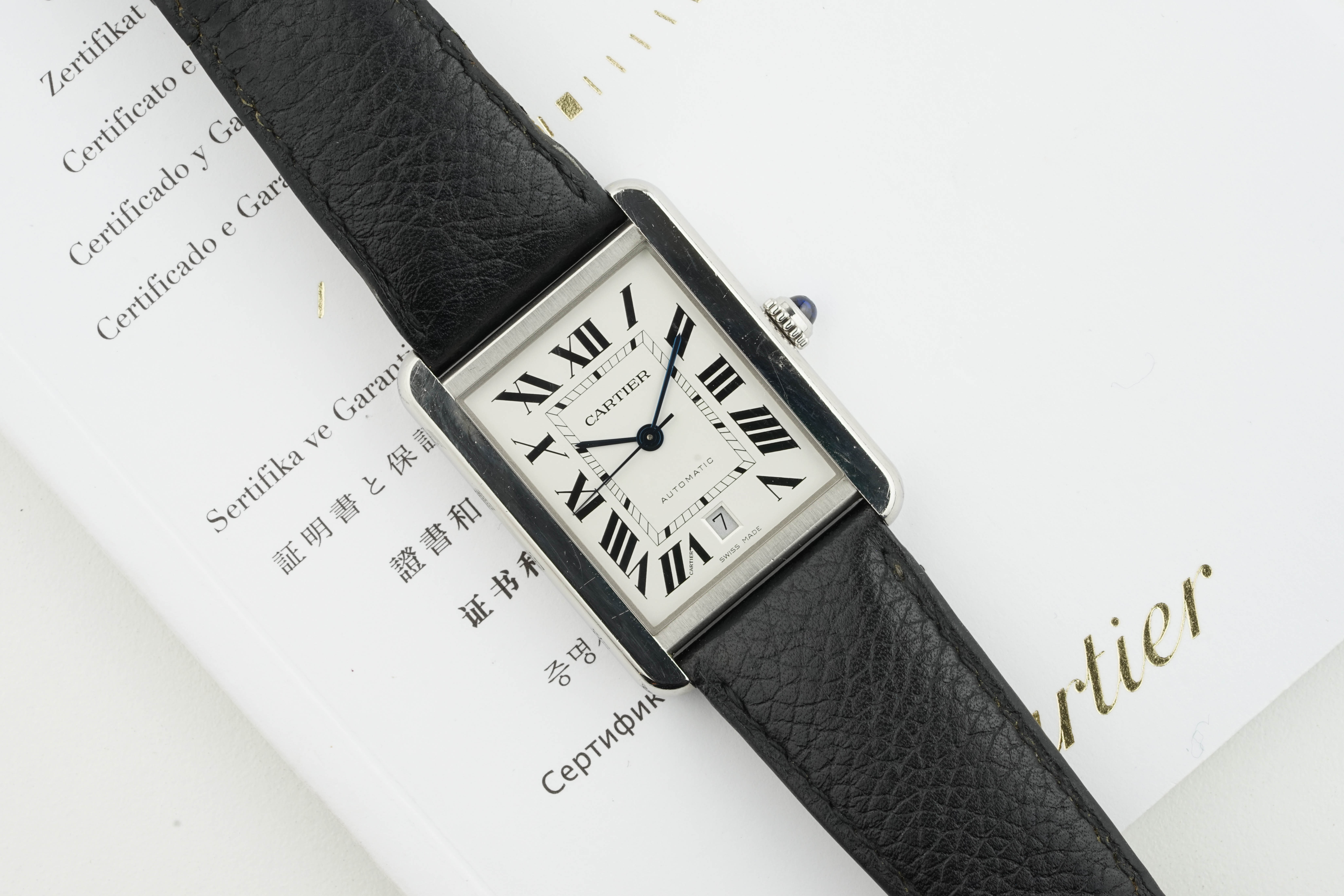 CARTIER TANK SOLO XL AUTOMATIC W/ GUARANTEE PAPERS REF. 3800, rectangular silver/white dial with