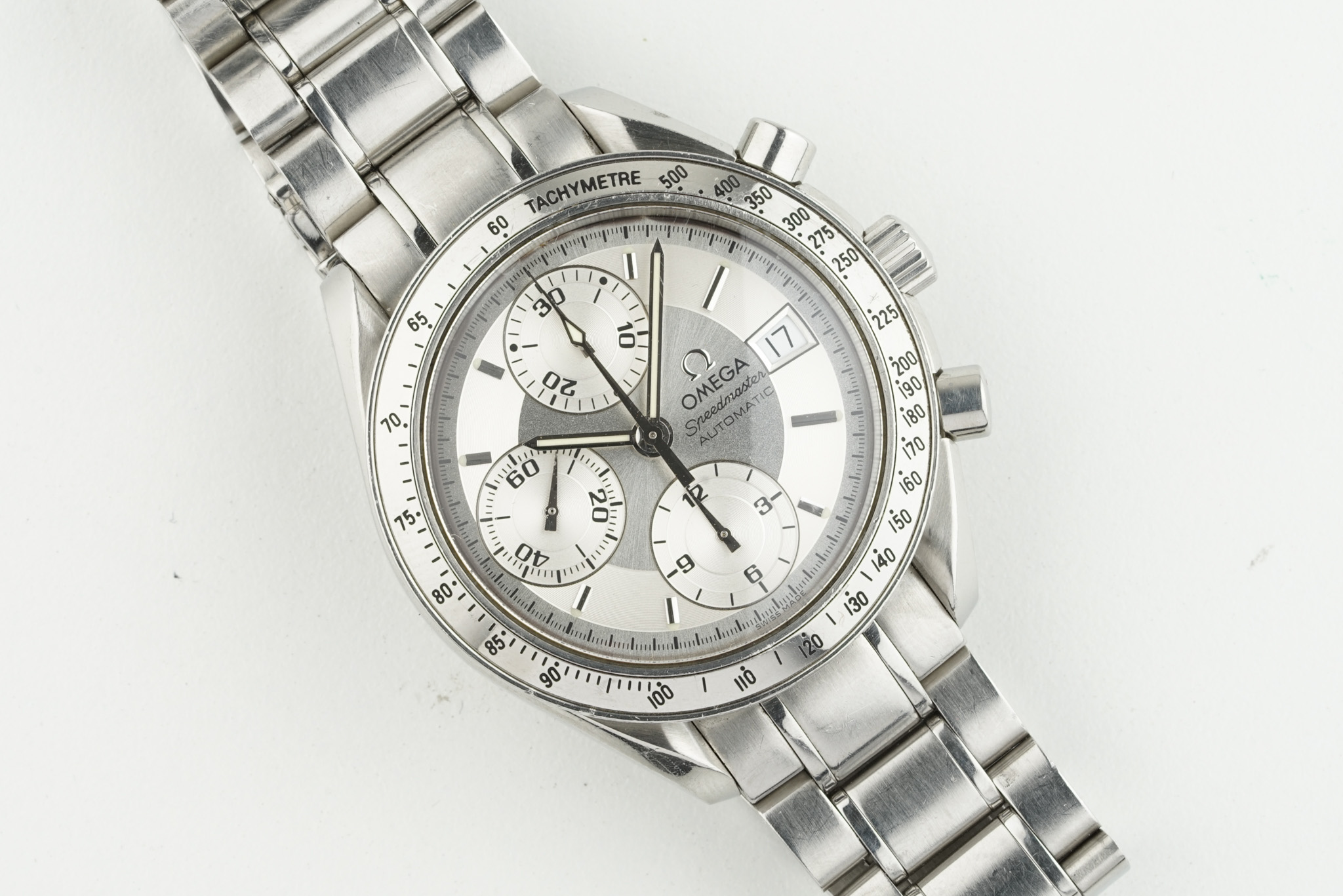 OMEGA SPEEDMASTER DATE AUTOMATIC CHRONOGRAPH, circular silver dial with stick hour markers and