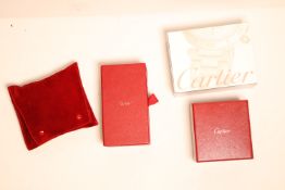 *To Be Sold Without Reserve* Cartier Assortment of Cartier items including a cleaning kit,*sold as
