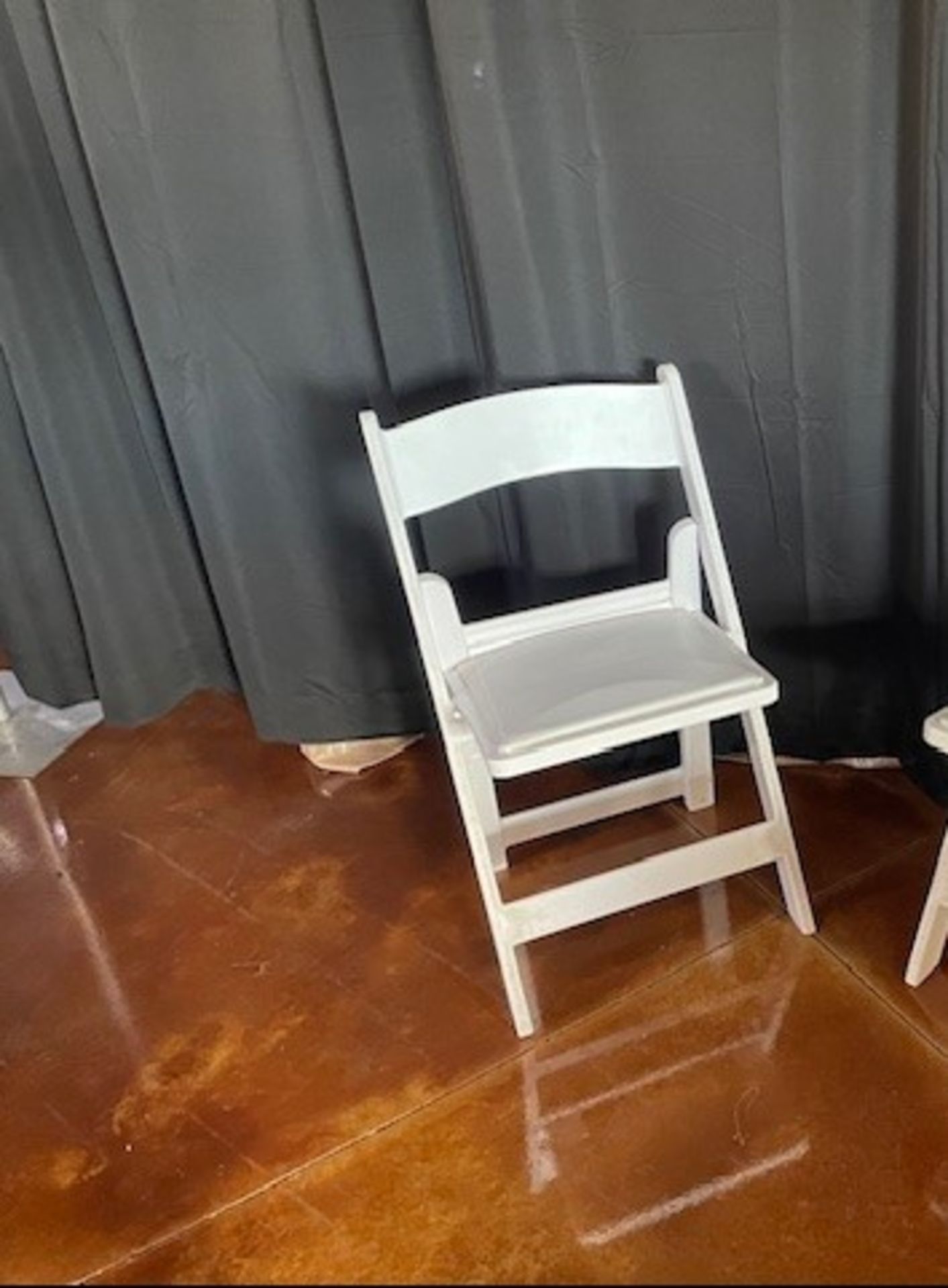 *Located in Tupelo, MS White Resin Padded Folding Chairs, Grade B