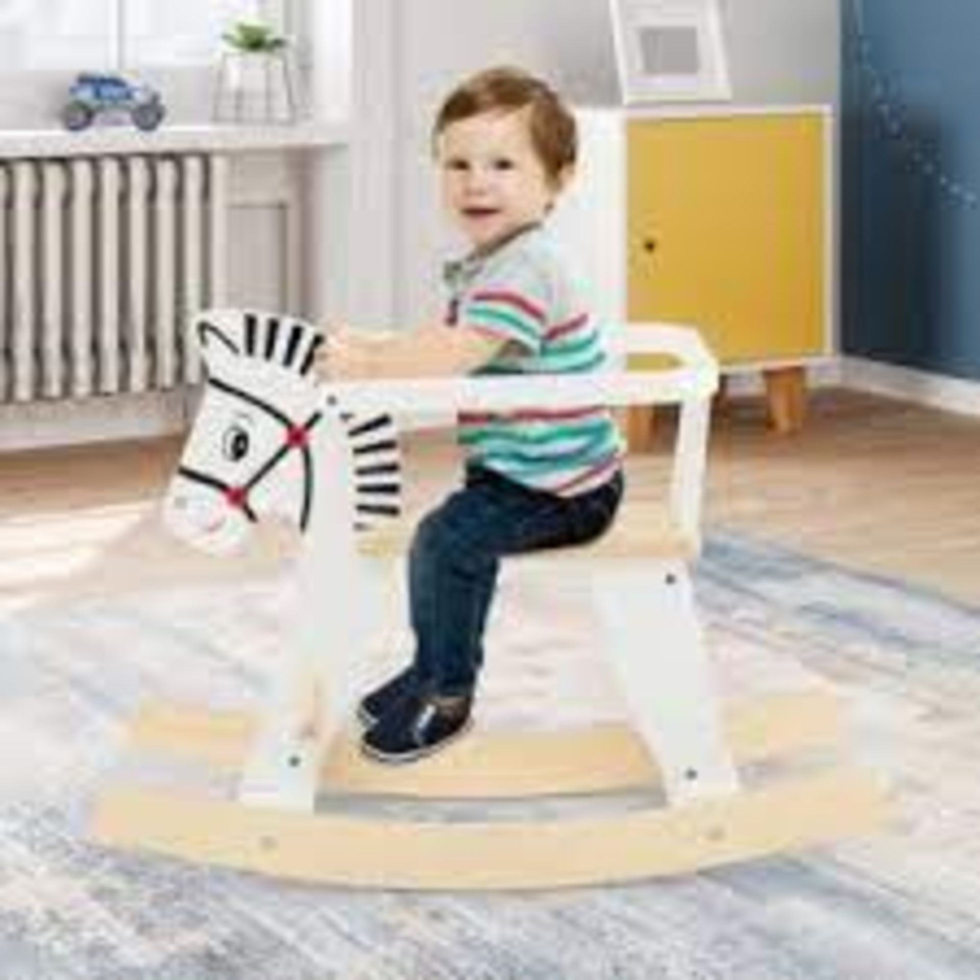 Rocking Horse. - R13.5. The curved base allows children to swing forward or backward at 11 to 22