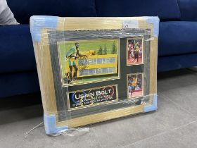 SIGNED AND FRAMED USAIN BOLT 100M, 200M, AND 4 X 100M RELAY GOLD MEDALLIST 2008 AND 2012 WITH