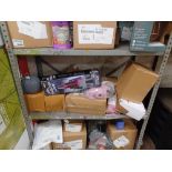 Full shelf of contents; may include household goods, gadgets, lighting, kids toys, decorations,