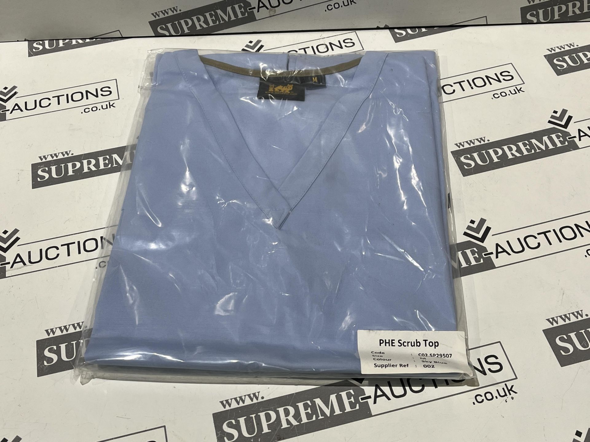 100 X BRAND NEW SKY BLUE SCRUBS SIZE MEDIUM R7-4