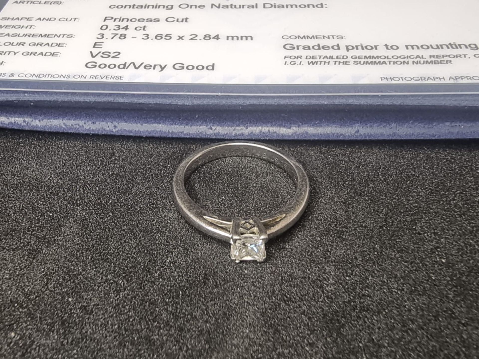 Certified Platinum Ring with 0.34 Carat Princess Cut Diamond. Colour Grade: E. Clarity Grade VS2