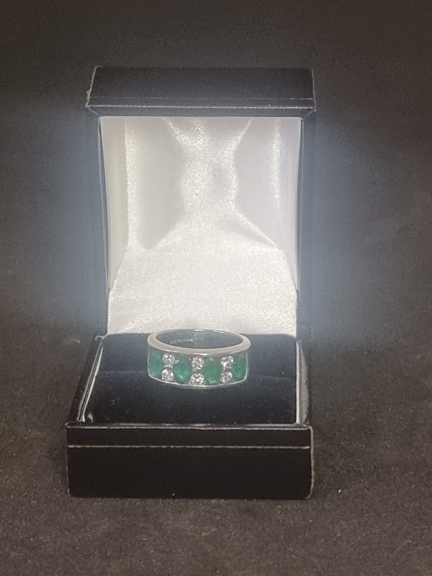 Elegant 18 Carat White Gold Ring with Diamonds & Green Stones