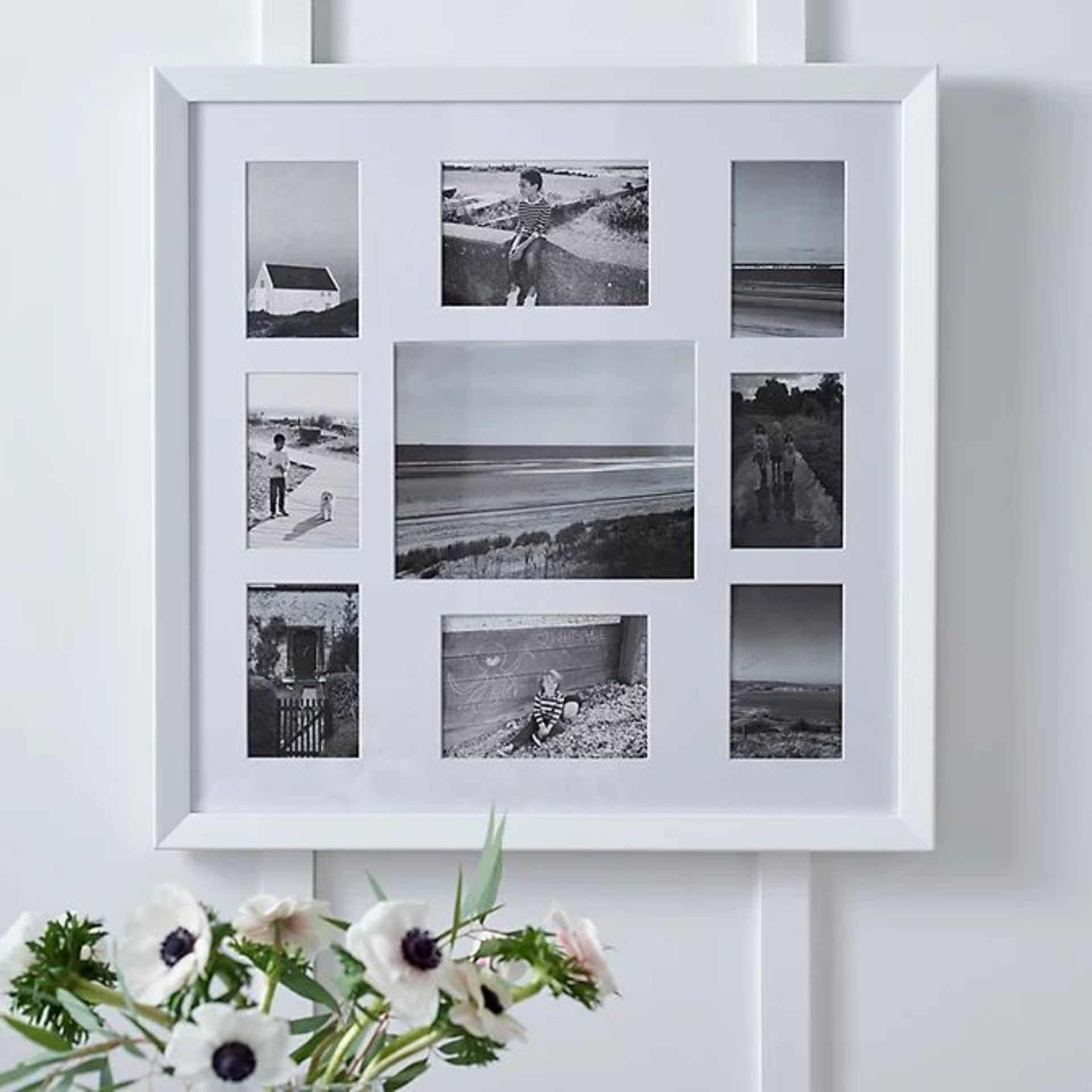 White Company 9 Aperture Wood Photo Frame. - R14.12. Our stylish and versatile wooden frame lets you - Image 2 of 2