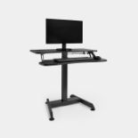 Black Sit Stand Adjustable Desk. - ER43. It is height adjustable from 74cm to 124cm, allowing you to