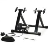 Indoor Bicycle Trainer Stand with 8 Resistance Levels. - ER25. When the weather is grim but you need