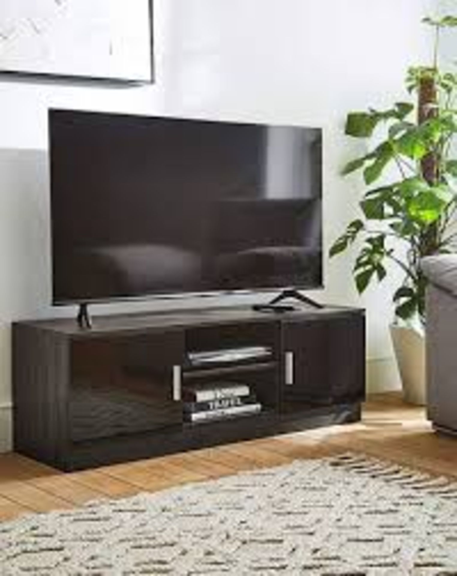 Miami TV Unit. - ER20. The Miami TV Unit is a black wood effect with a glossy black finish on the