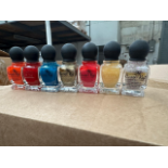 32000 X BRAND NEW ASSORTED NAIL VARNISH IN A VARIETY OF BRANDS SIZES AND COLOURS ON 2 PALLETS STR