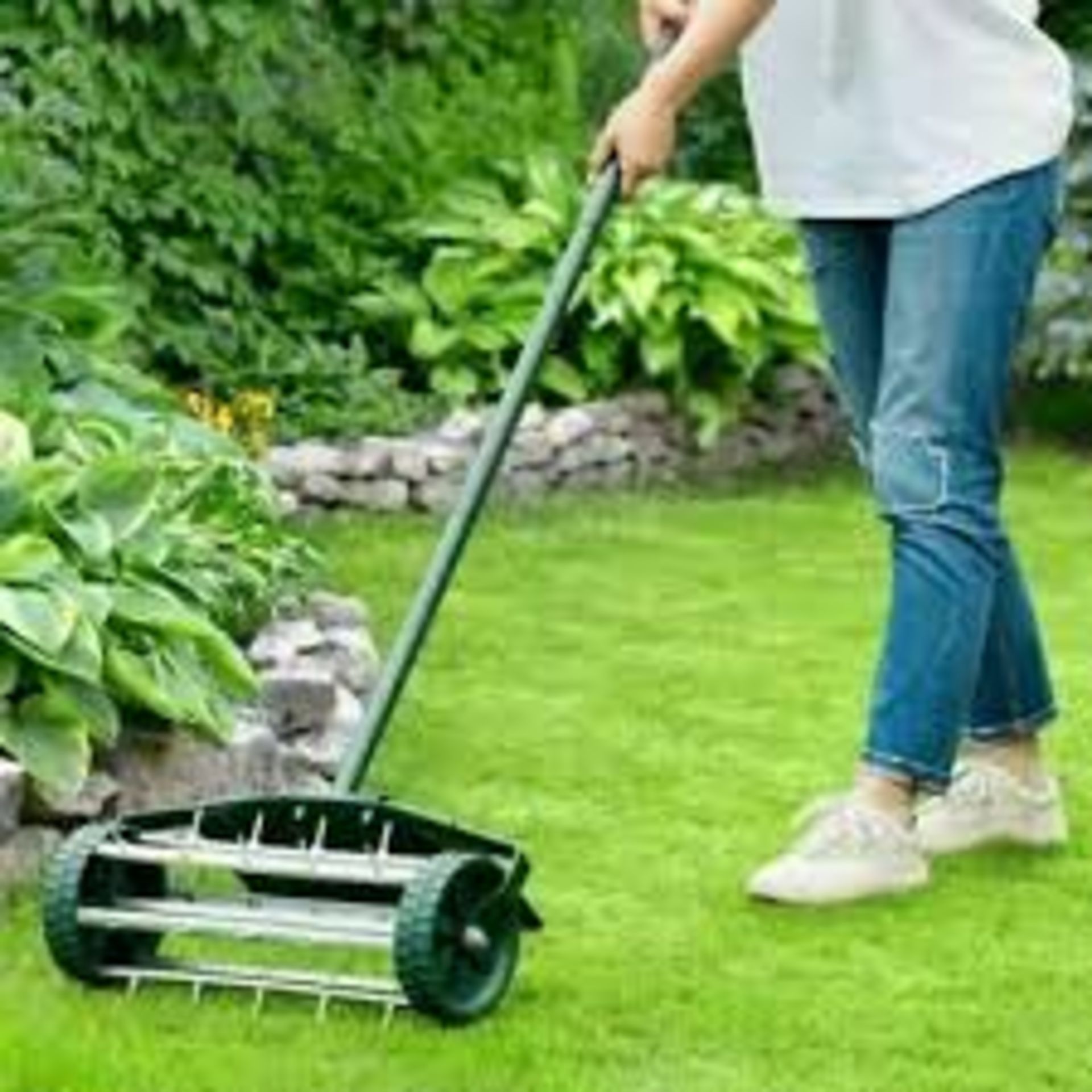 Heavy Duty Rolling Grass Lawn Garden Aerator. - R14.13.