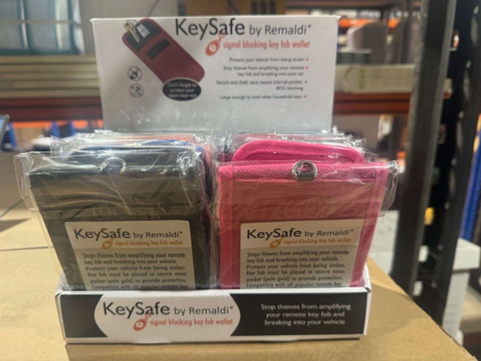 72 X BRAND NEW KEY SAFE BY REMALDI SIGNAL BLOCKING KEY FOB WALLETS IN VARIOUS COLOURS IN DISPLAY