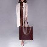 Genuine Burberry Embossed Crest Leather Tote. Burgendy