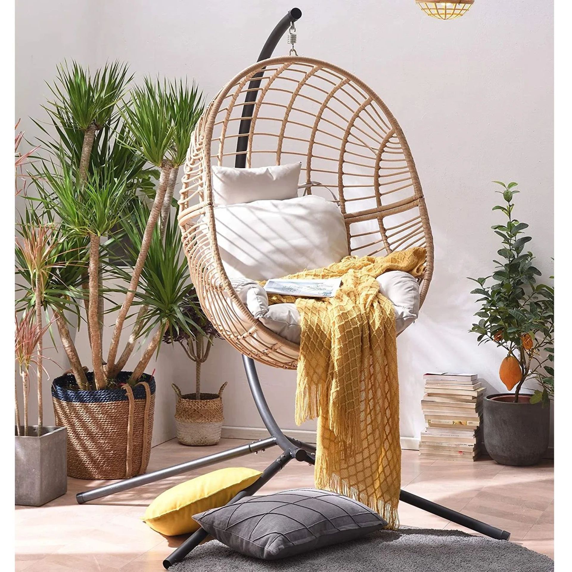 Marigold Rattan Effect Hanging Egg Chair. - R14. RRP £235.99. Our Marigold Hanging Egg Chair will be