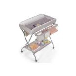 Rolling Baby Changing Table with Large Storage Basket. - R14.14. The changing table cares for the