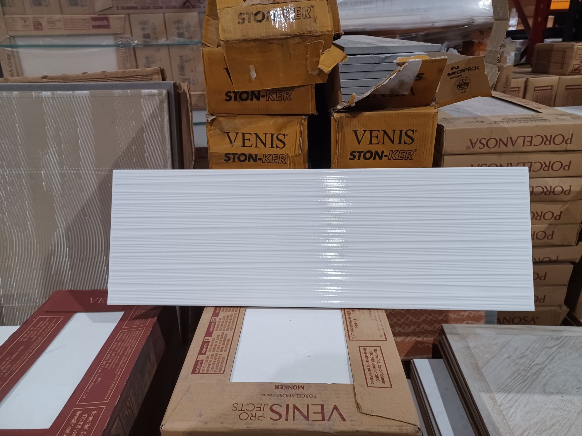 3 packs of Gloss Thin Line White 200x600mm Tiles. Each Box Contains 1m2, giving this lot a total