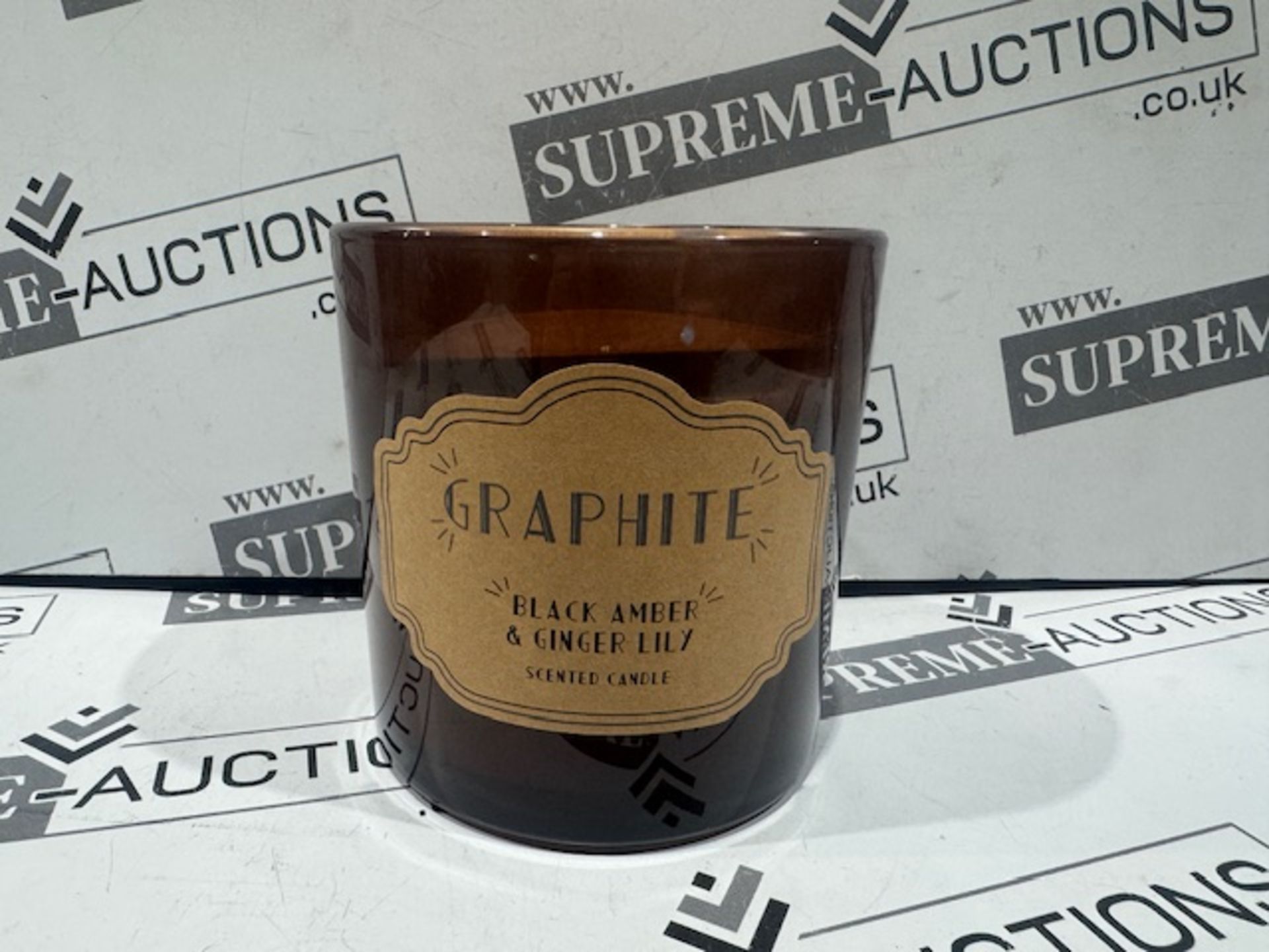 6 x New & Packaged 575g Luxury Graphite Black Amber & Ginger Lily Scented Candles. RRP £27.50 each.