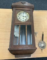 3 Key hole Westminister chime wall clock, with key and pendulum, untested 34 inches long