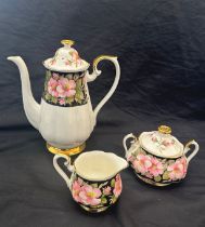 Three pieces of Royal Albert pattern Provincial Rose Alberta Rose a tea pot, sugar bowl and milk jug