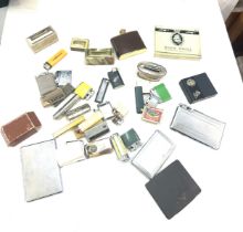 Large selection of smoking ephemera includes lighters, cigarette cases etc