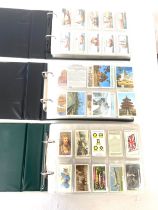Selection of cigarette/ tea/ collectors cards in three albums includes full sets includes players,