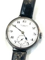 WW1 period Benson military trench watch with a silver case, winds up and ticks