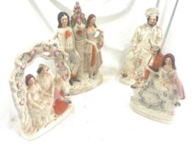 4 Antique Staffordshire figures, tallest measures approximately: 17.5 inches