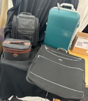 Selection of travel bags to include a Carlton bag and small wheelie case