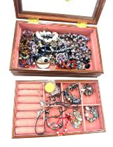 Selection of vintage and later costume jewellery includes silver charm bracelets, scottish brooch,