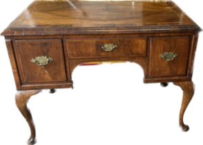 mahogany three drawer Queen Anne desk measures approx 31 inches tall by 42 wide and 22 deep