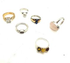 Selection of ladies rings to include silver and amber etc