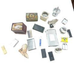 Large selection of smoking ephemera includes lighters, cigarette cases etc