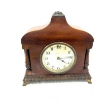 Small ornate mahogany mantel clock with carved pillars, untested, approximate measurements: Height 9