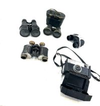 Selection of assorted binoculars and a Kodak camera