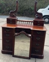 13 drawer Victorian mahogany dressing table measures approx 70 inches tall by 50 inches wide by 22