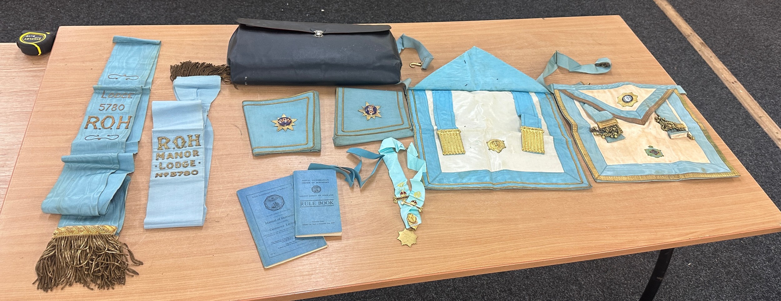 Large selection of assorted masonic items includes aprons etc