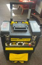 Stanley 3 tier portable tool box on wheels and contents and 1 other plastic tool box