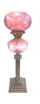 Victorian nelson column base oil lamp with funnel and shade, height approximately