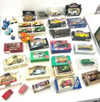 Selection of diecast boxed and unboxed cars