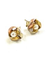 Pair 9ct gold two tone ladies pearl set earrings, knot design.