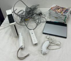 Large selection of nintendo WII games and console, untested