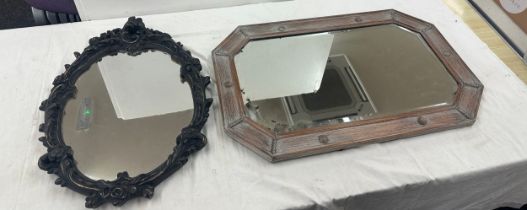 Oak Framed bevelled edge mirror and 1 other largest measures approximately 32 inches wide 22