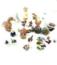 Selection of animal bird figures to include porcelain, glass, Bewick, Secret world etc