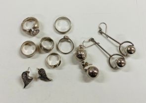 Six silver rings and 3 pairs of earrings weight approx 66g