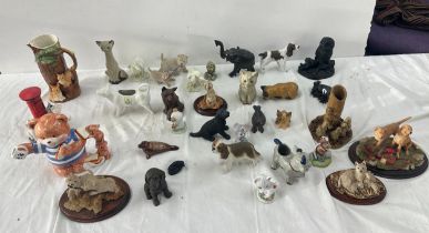 Large selection of animal figures includes cats, dogs etc