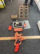 Pair of car ramps, battery charger, tow rope and a selection of pipes etc